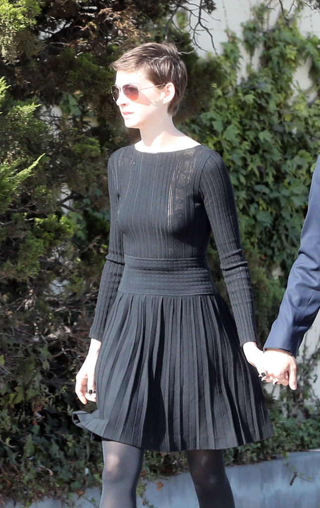 Anne Hathaway showing legs in short dress out in LA